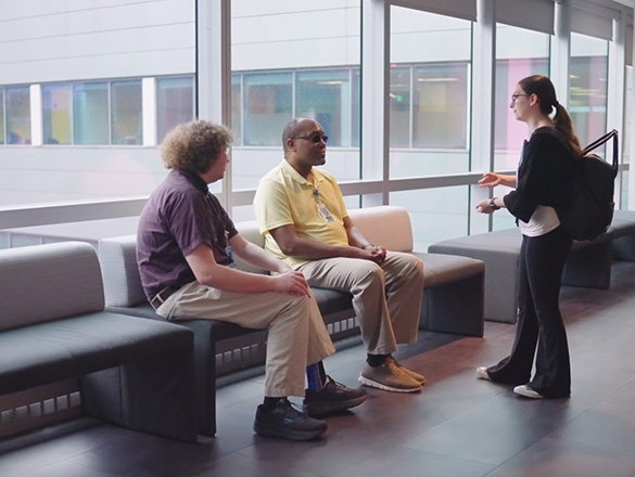 Three people having a chat