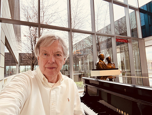 local-musician-plays-piano-at-two-eskenazi-health-locations