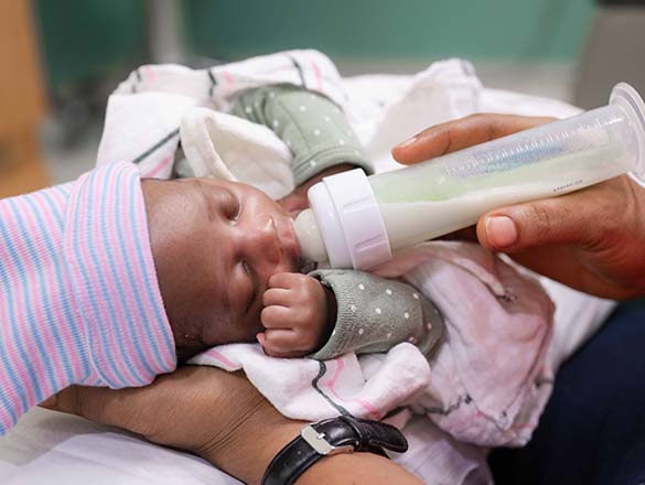 Baby in NICU being bottlefed
