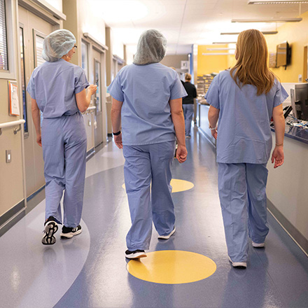 Providers in the burn unit walking away from the camera